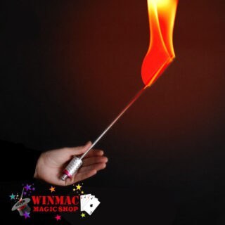Fire torch transforms into magic appearing cane in stage performance