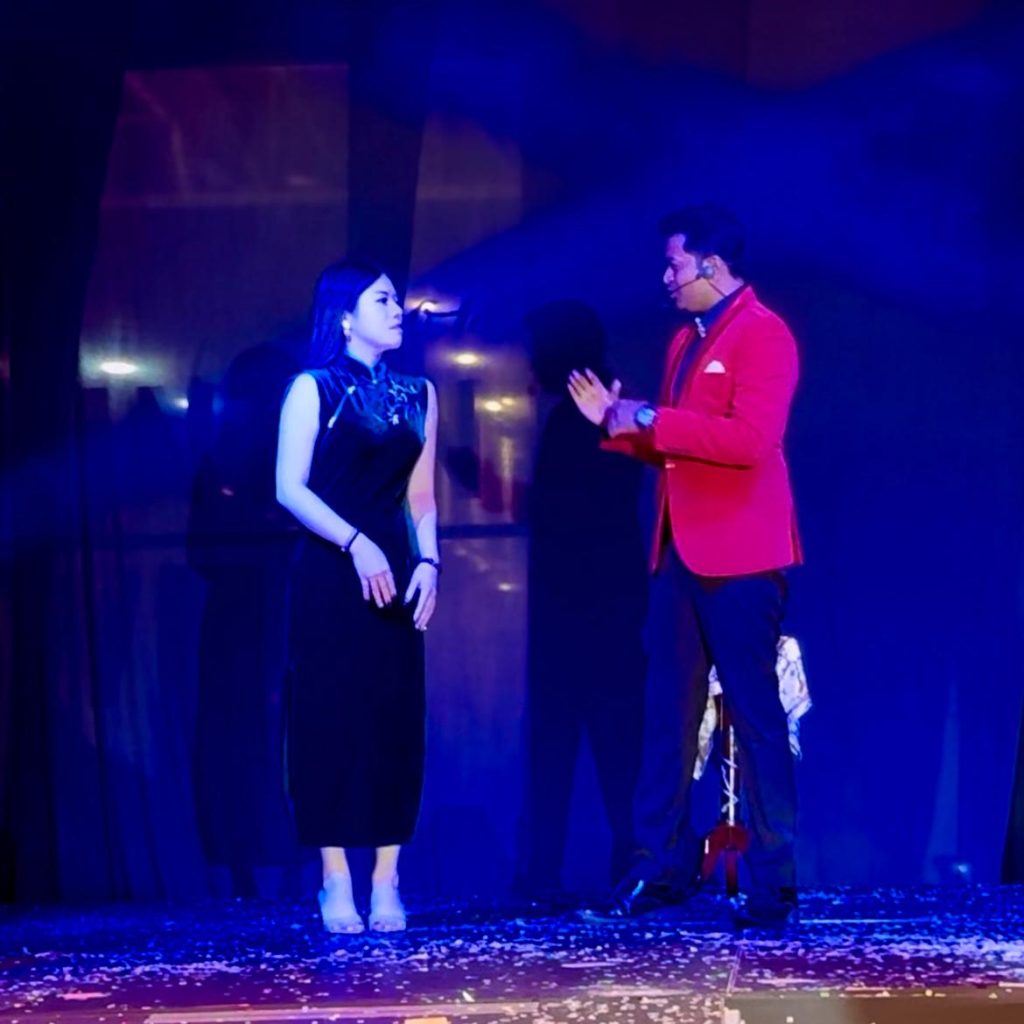Prince Harun performing a professional stage magic show in Thailand