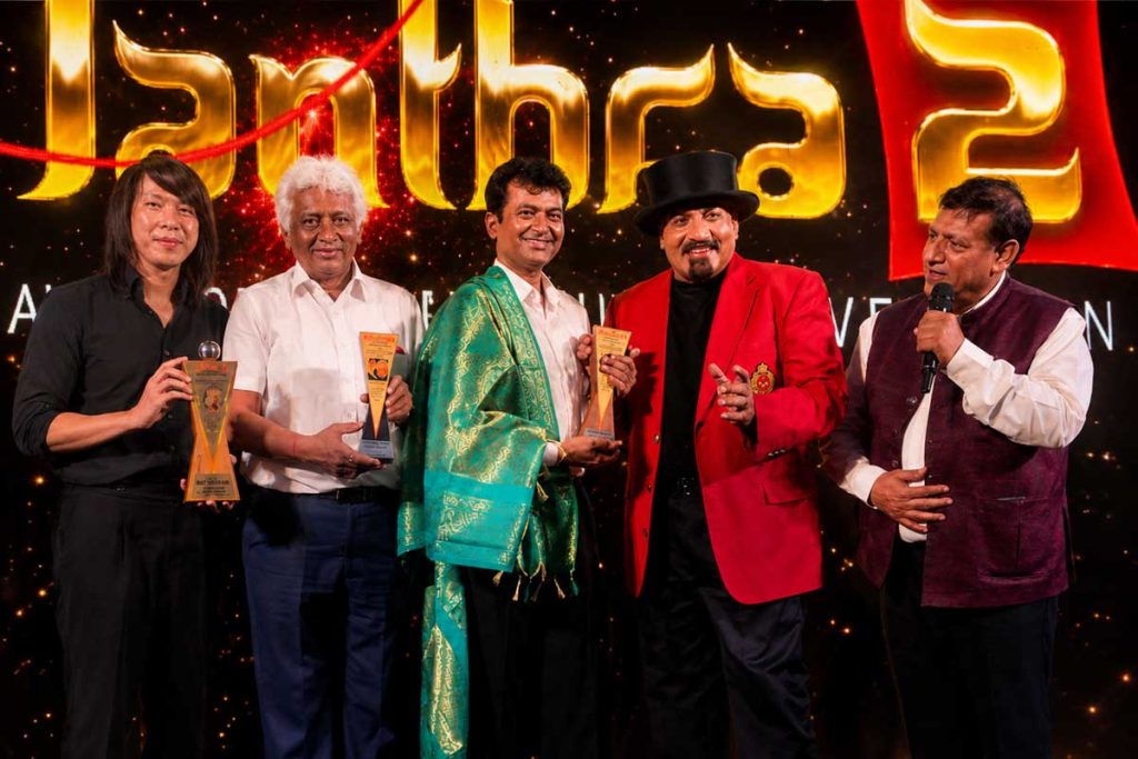 Prince Harun Professional Magician in Bangladesh receiving an international magic award